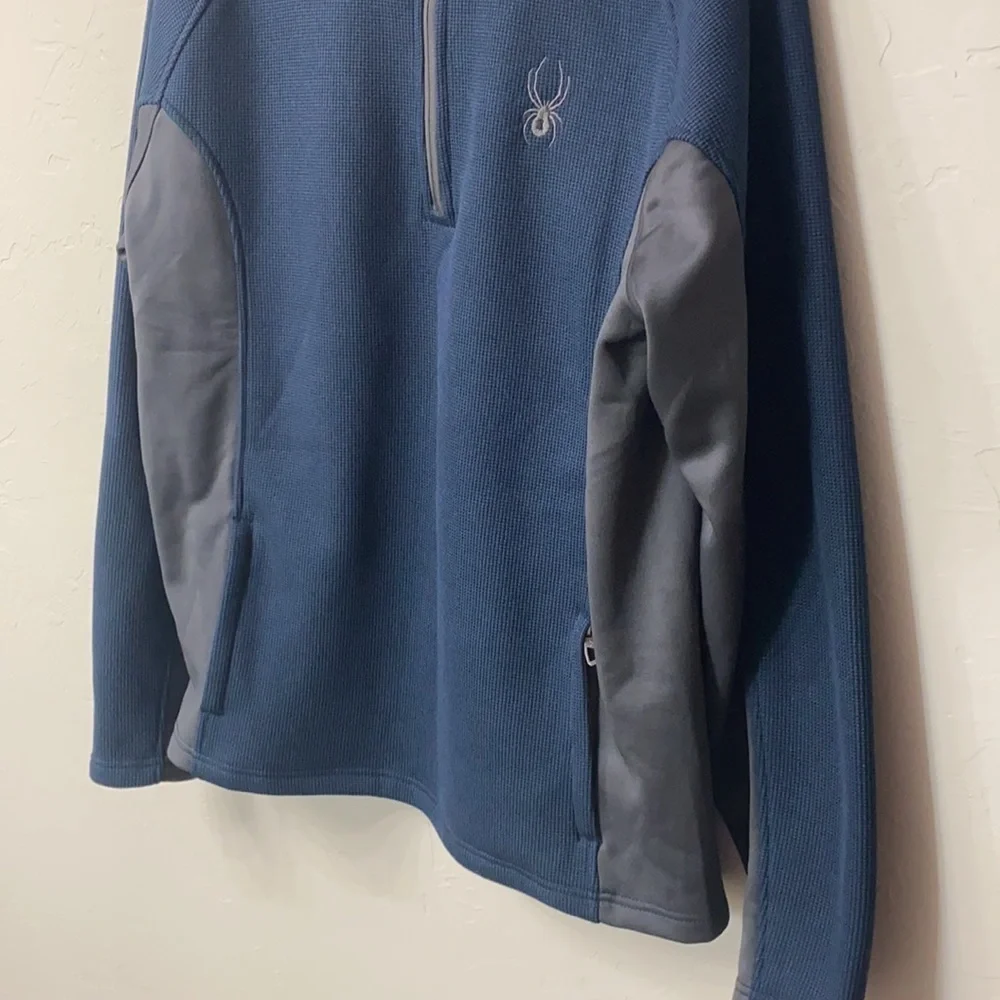 Spyder 1/4 zip Blue and gray jacket size medium.